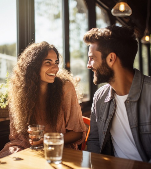 Happy couple smiling on a date