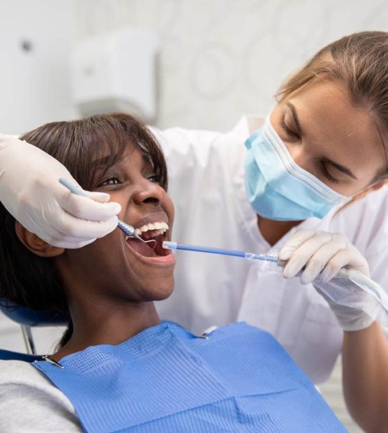 Female patient undergoing a dental checkup