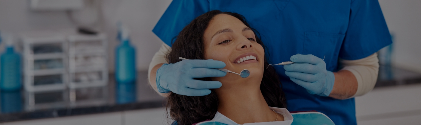 Encino dentist Doctor Stella Stavrou treating a patient