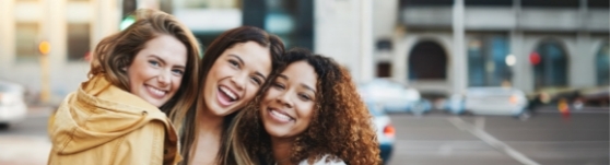 Three smiling friends
