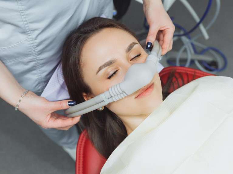 Woman getting nitrous oxide before procedure at signature smiles, encino ca